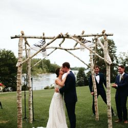 A Maine camp wedding photobombed by the couple's doggo