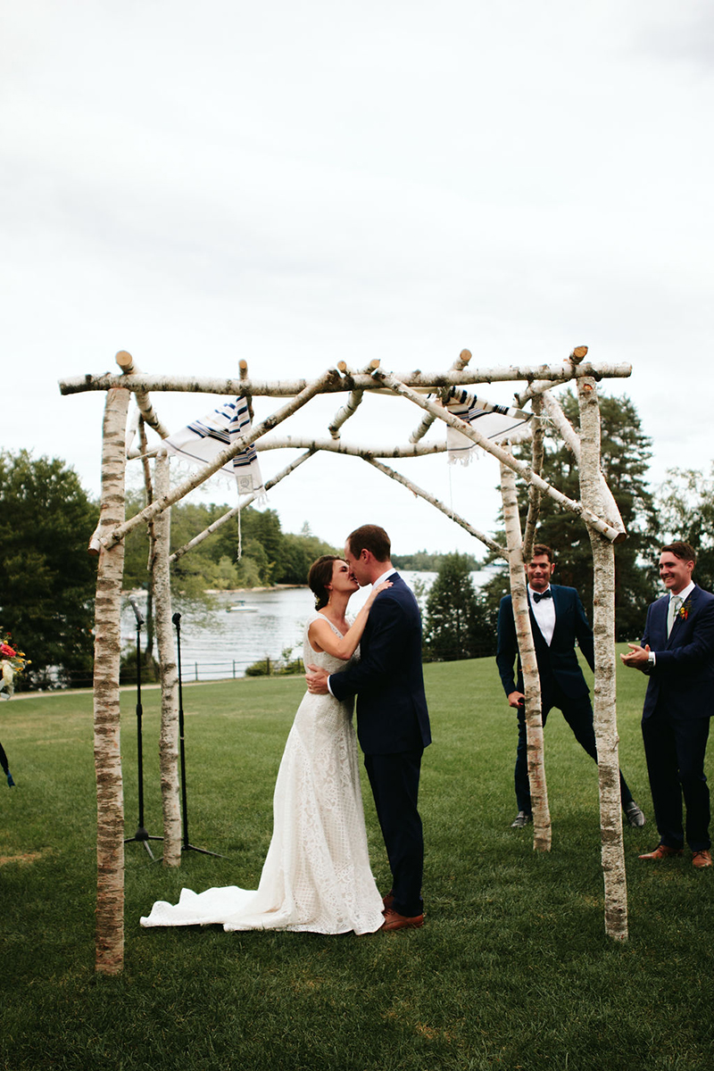 A Maine camp wedding photobombed by the couple's doggo