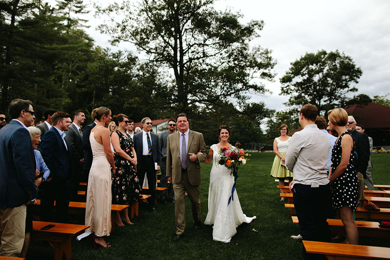 A Maine camp wedding photobombed by the couple's doggo