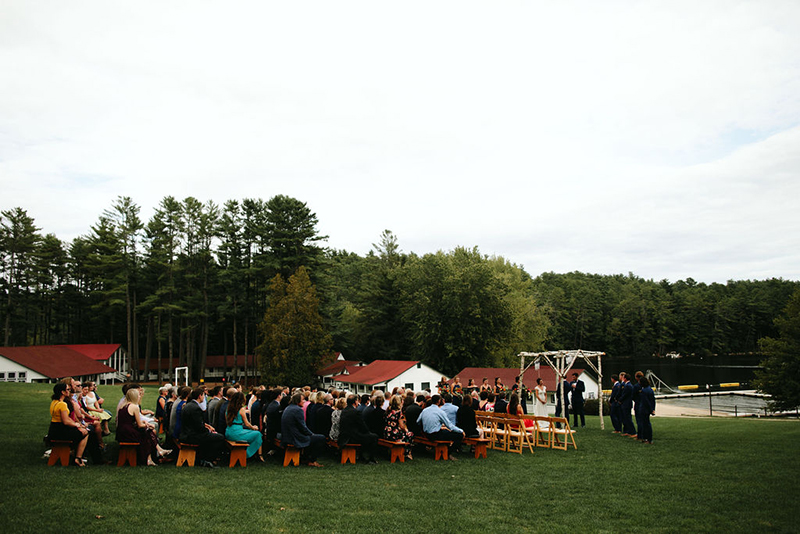 A Maine camp wedding photobombed by the couple's doggo