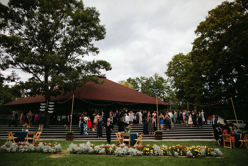 A Maine camp wedding photobombed by the couple's doggo