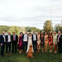 A Maine camp wedding photobombed by the couple's doggo