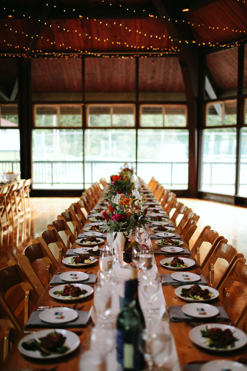 A Maine camp wedding photobombed by the couple's doggo