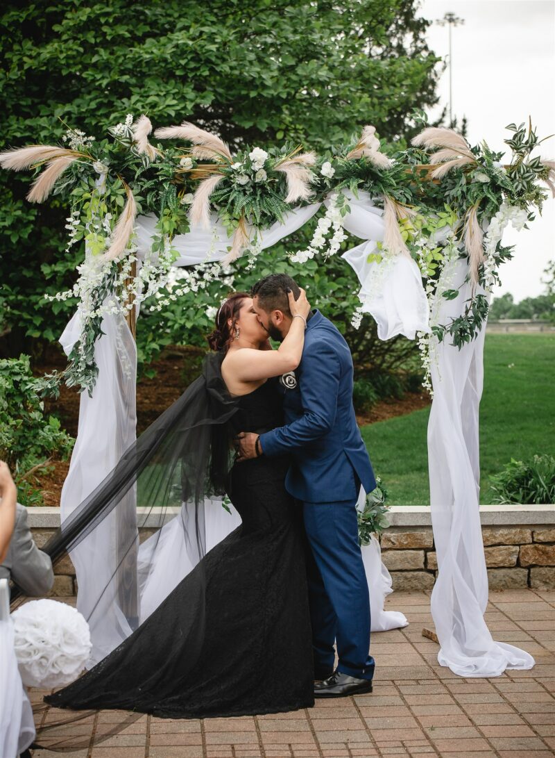 When the bride’s in a black wedding dress with bridesmaids in white!