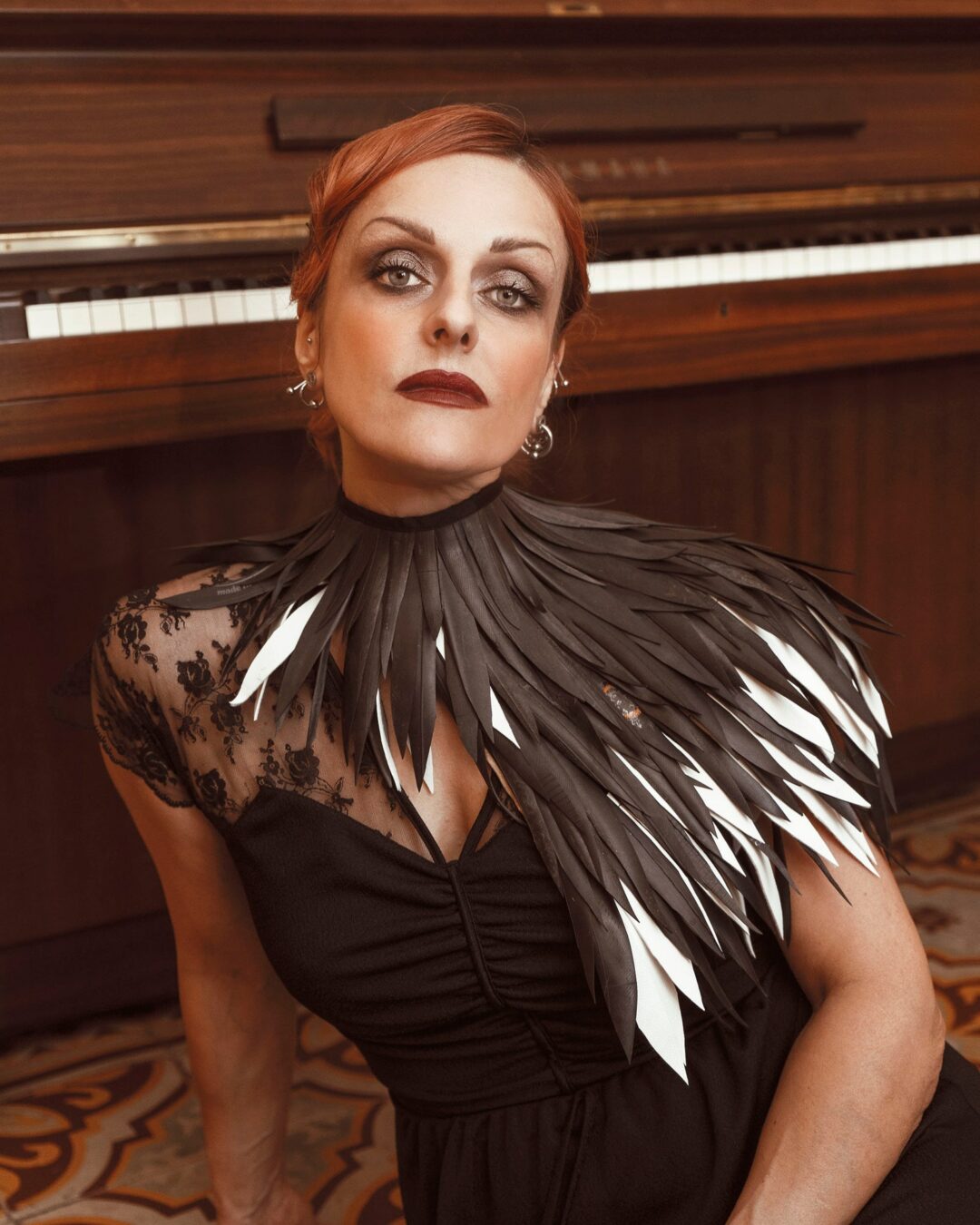 Handmade collar with feathers made of recycled inner tube
