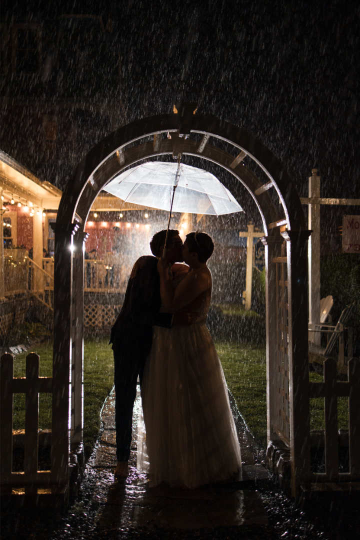 This cosmic couple had a beautiful, rainy wedding by the seaside
