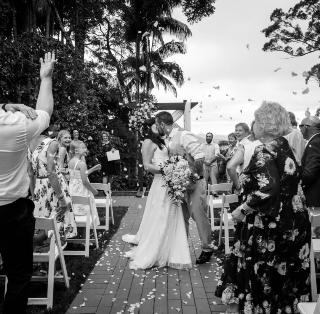 Hannah and Ryan kiss the bride